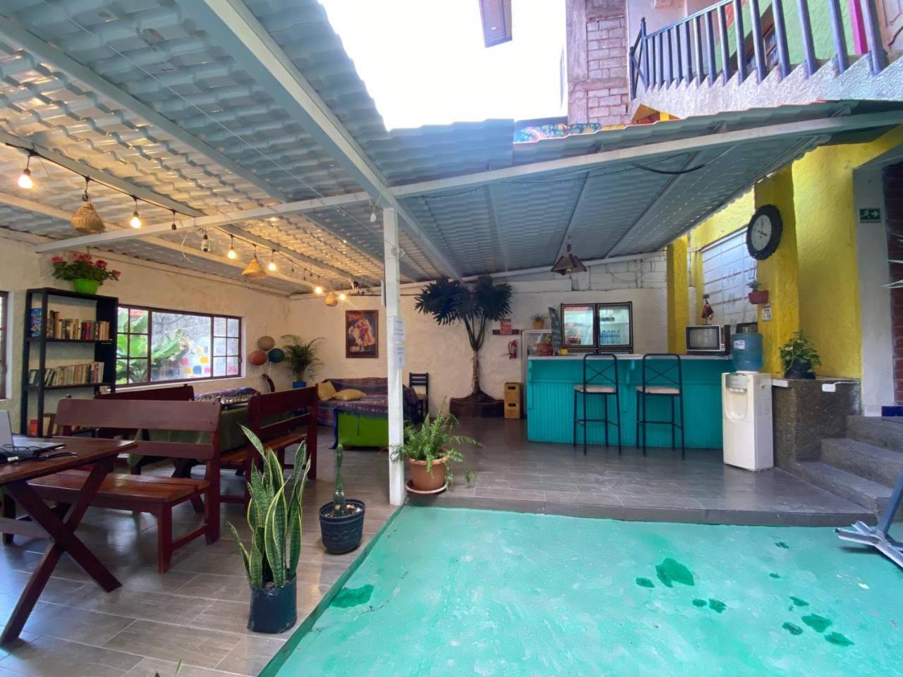 Garden House Hostal بانيوس المظهر الخارجي الصورة