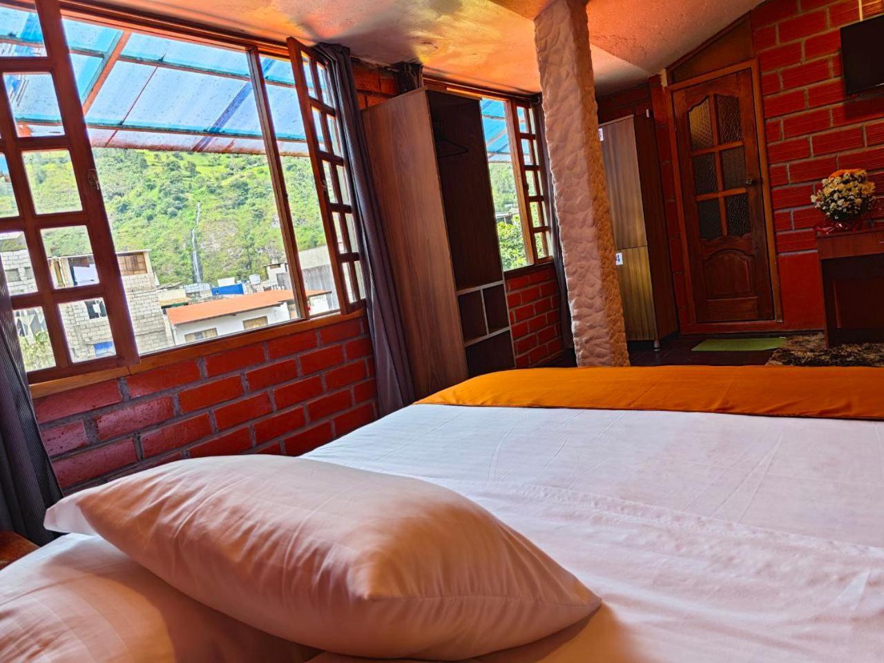 Garden House Hostal بانيوس المظهر الخارجي الصورة