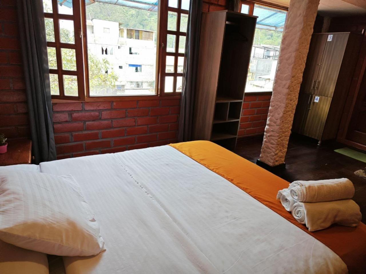Garden House Hostal بانيوس المظهر الخارجي الصورة