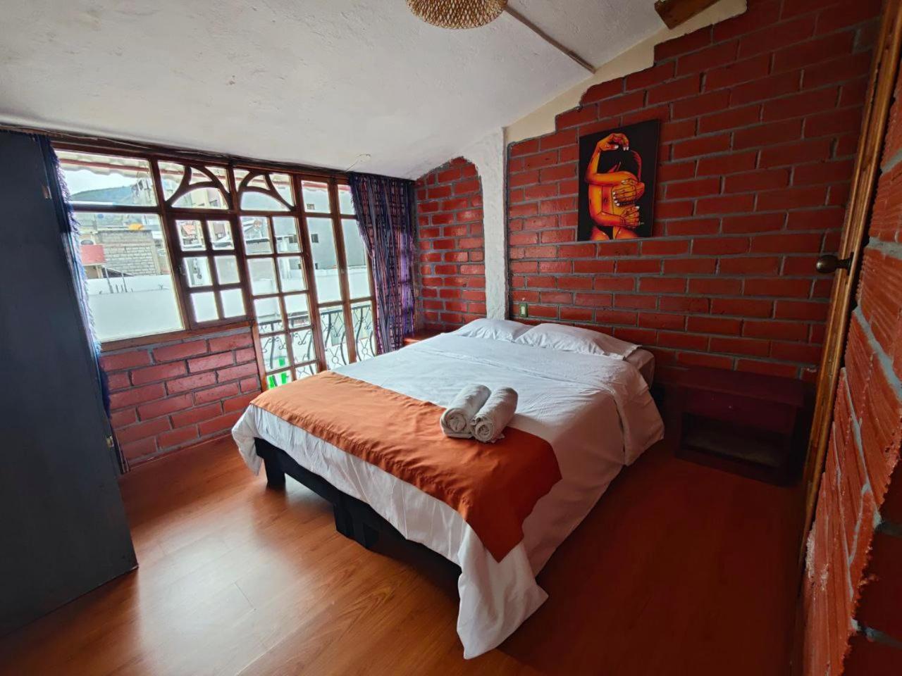 Garden House Hostal بانيوس المظهر الخارجي الصورة