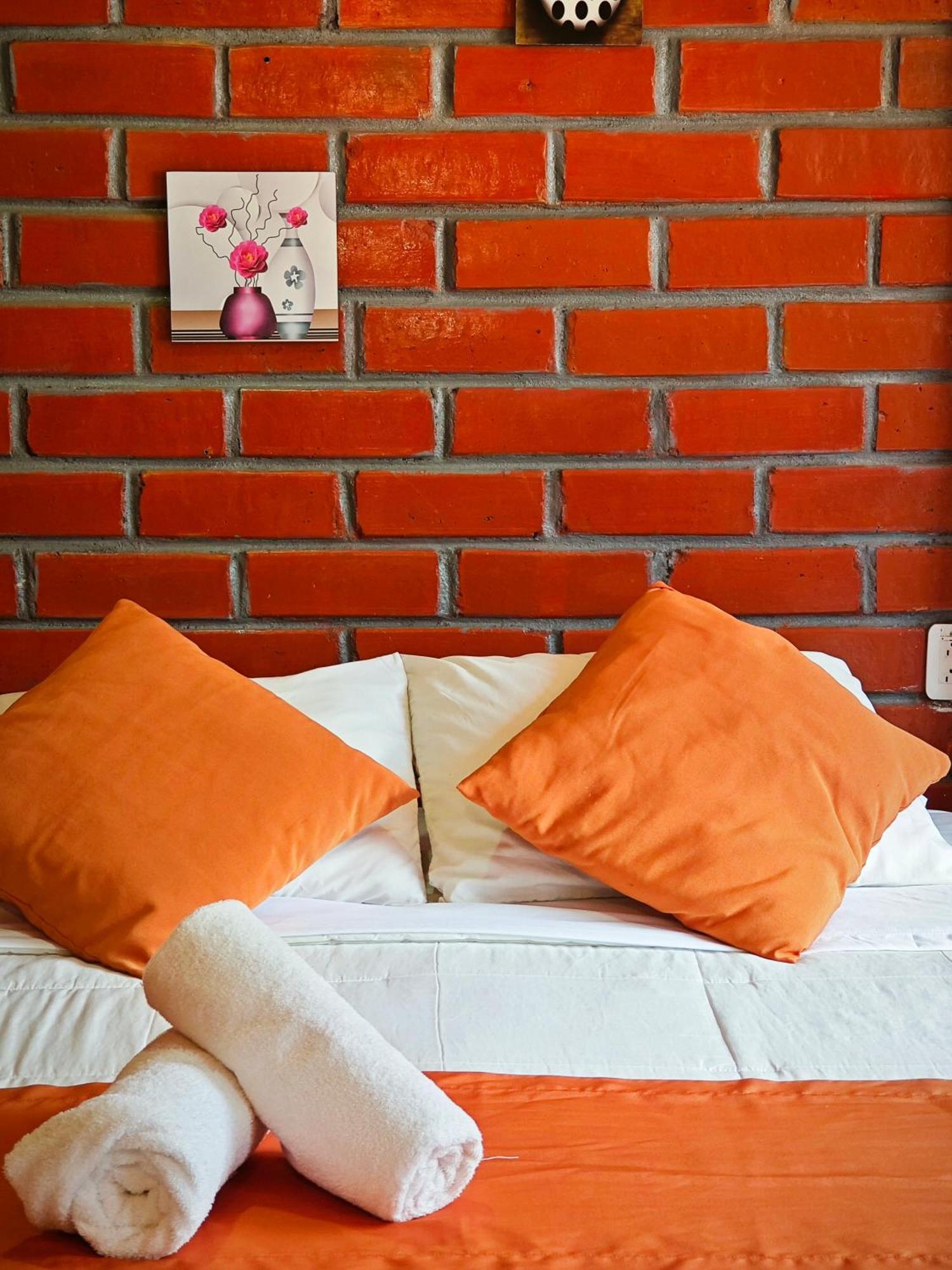 Garden House Hostal بانيوس المظهر الخارجي الصورة