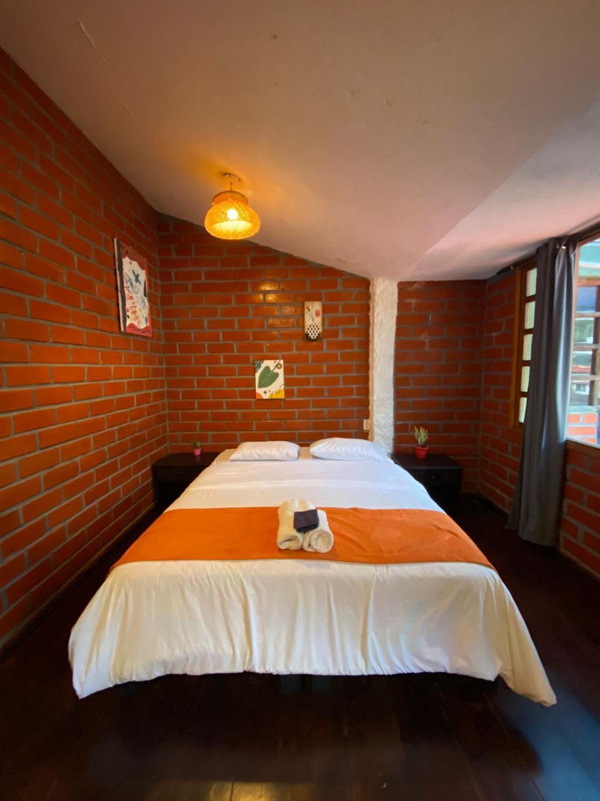Garden House Hostal بانيوس المظهر الخارجي الصورة