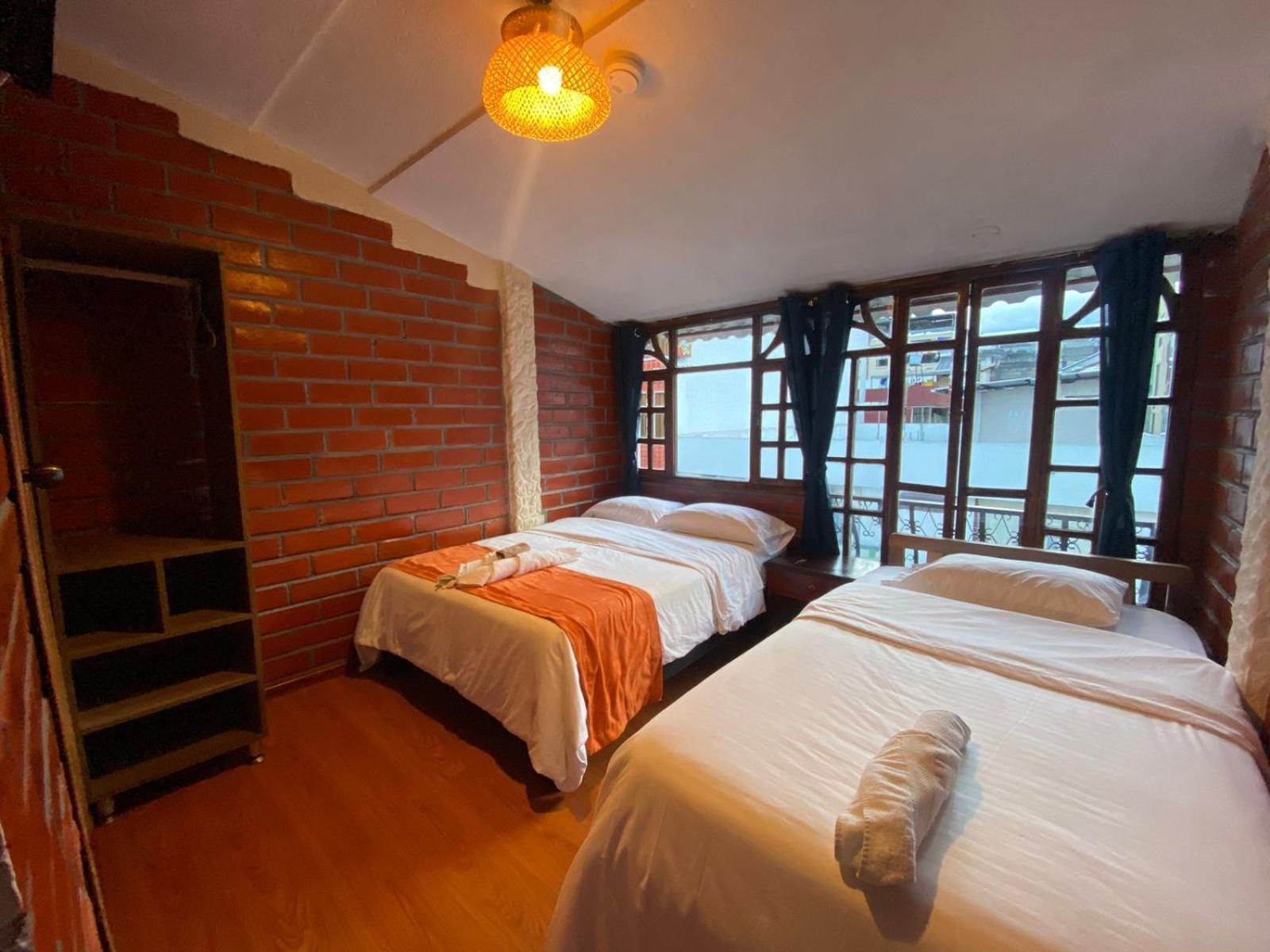 Garden House Hostal بانيوس المظهر الخارجي الصورة