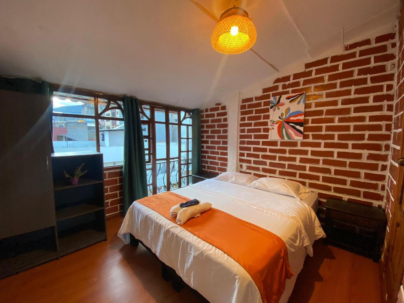 Garden House Hostal بانيوس المظهر الخارجي الصورة