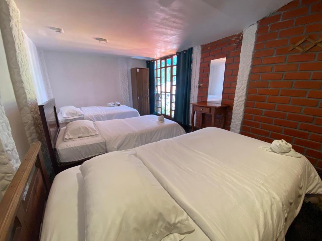 Garden House Hostal بانيوس المظهر الخارجي الصورة