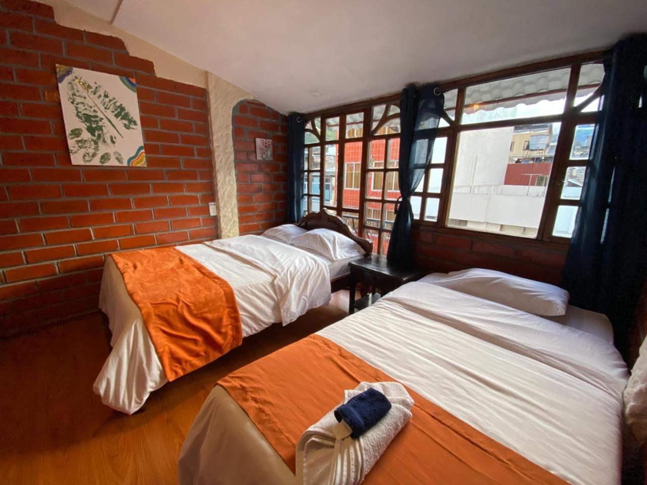 Garden House Hostal بانيوس المظهر الخارجي الصورة