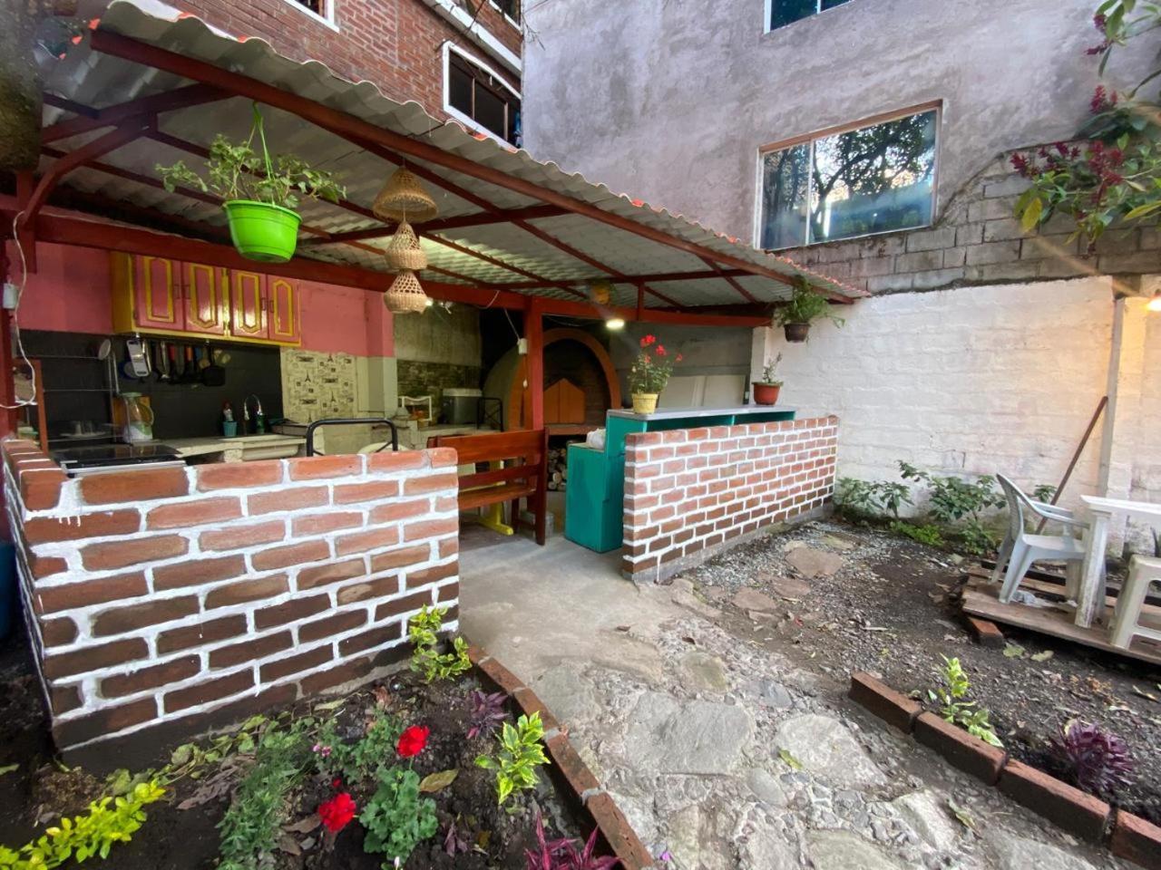 Garden House Hostal بانيوس المظهر الخارجي الصورة