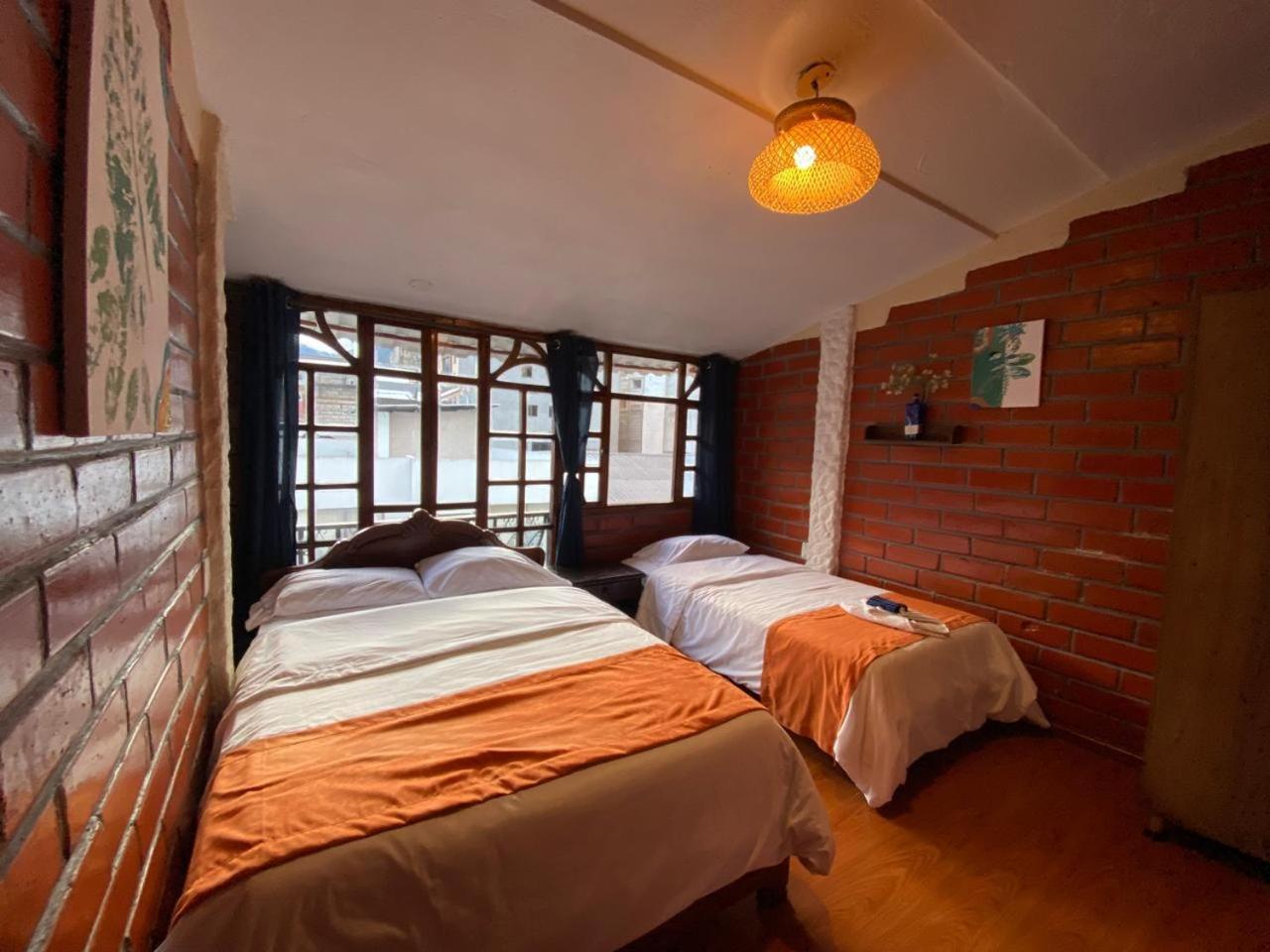 Garden House Hostal بانيوس المظهر الخارجي الصورة