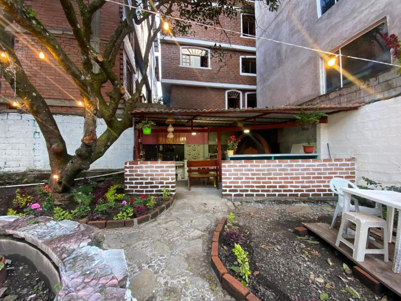 Garden House Hostal بانيوس المظهر الخارجي الصورة