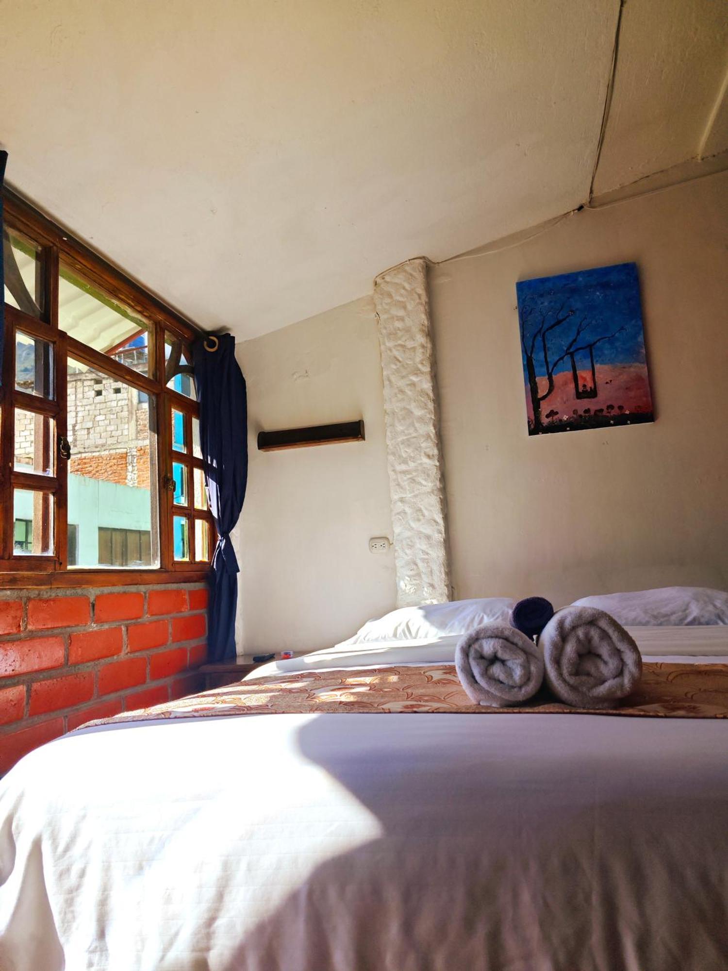 Garden House Hostal بانيوس المظهر الخارجي الصورة