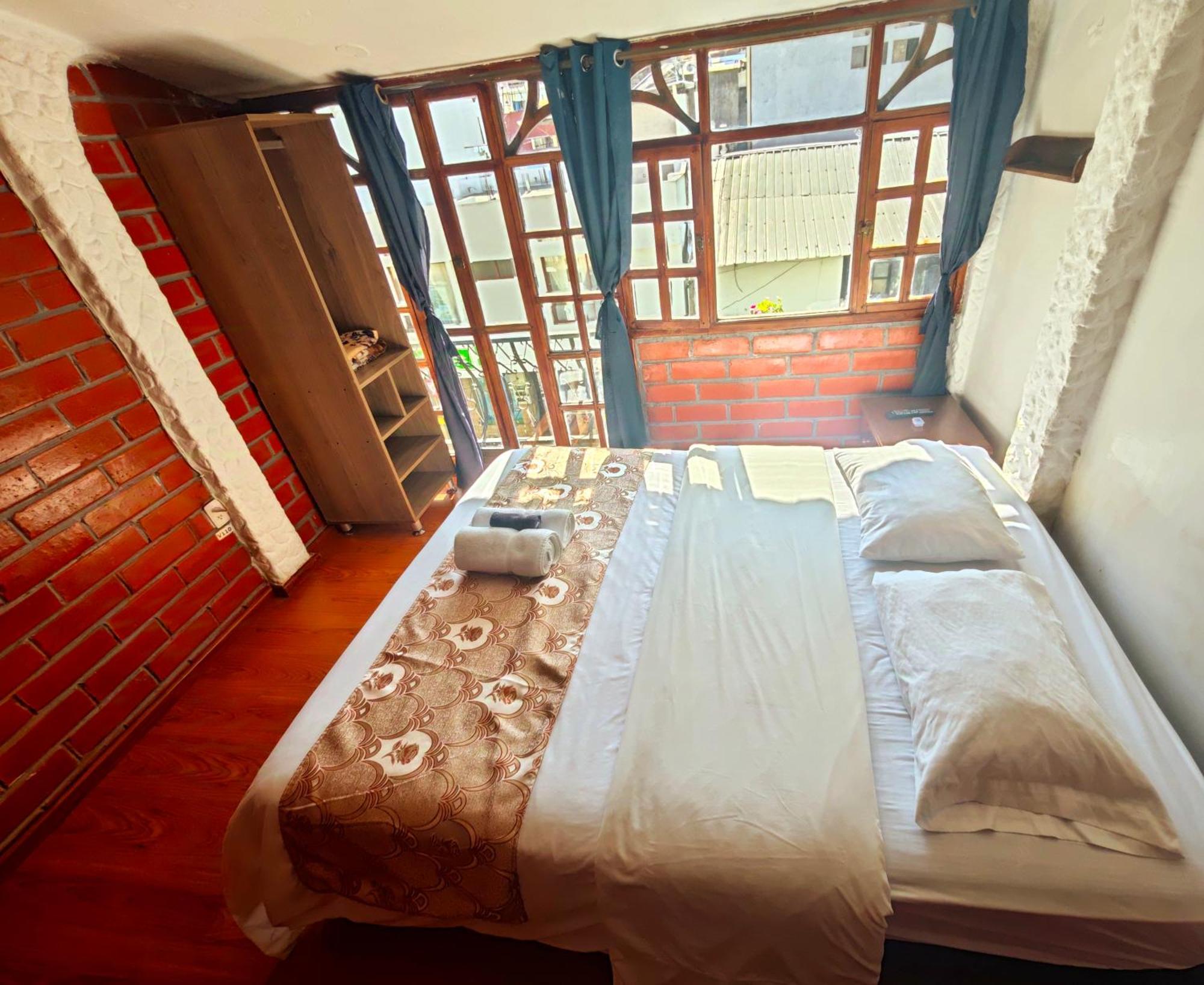Garden House Hostal بانيوس المظهر الخارجي الصورة